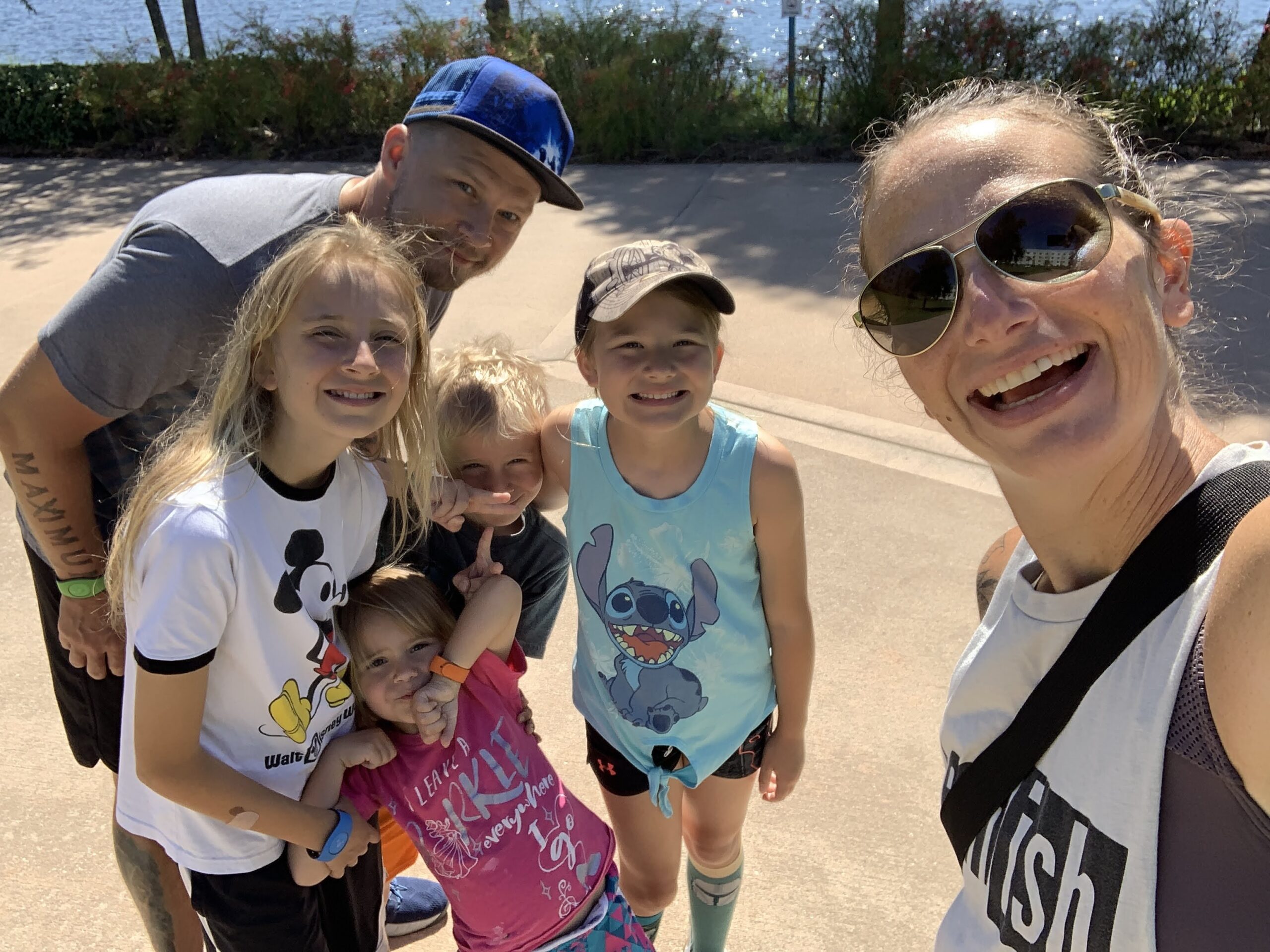 family of 6 at Disney World on a hot Florida summer day