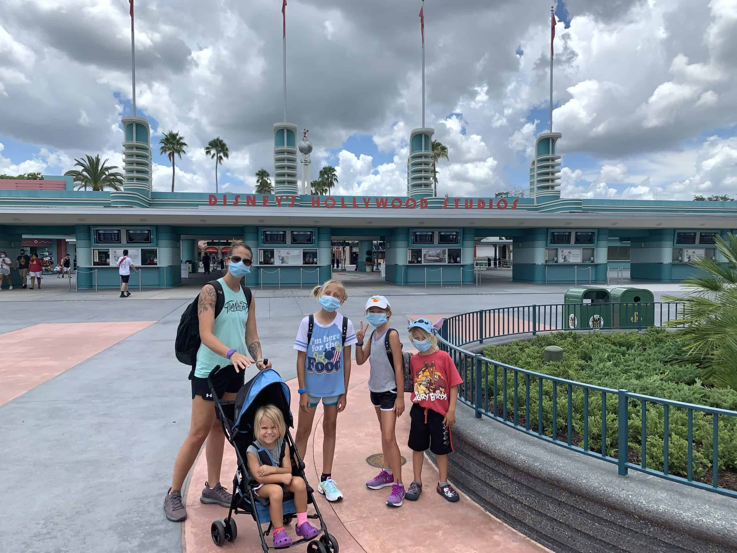 mom and 4 kids in the disney hollywood studios entrance